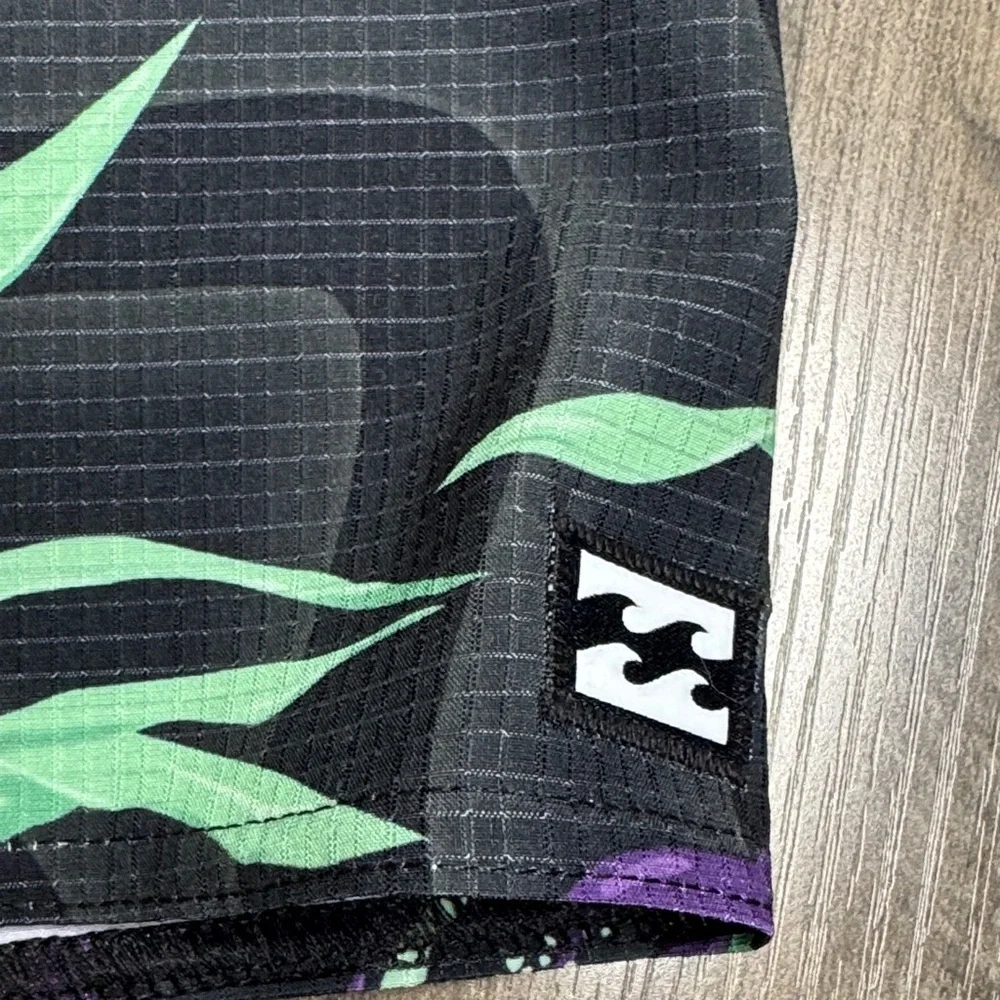 Billabong Black Board Shorts with Orange and Green Design